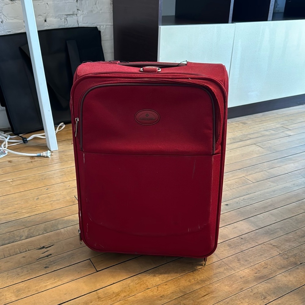 Red Samsonite suitcase (perfect for carry on)